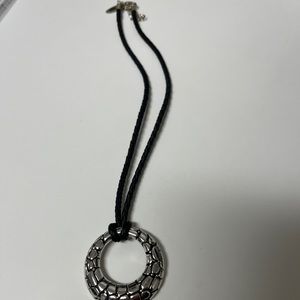 Avenue Black Corded Necklace With Silver Tone Circle Pendant.